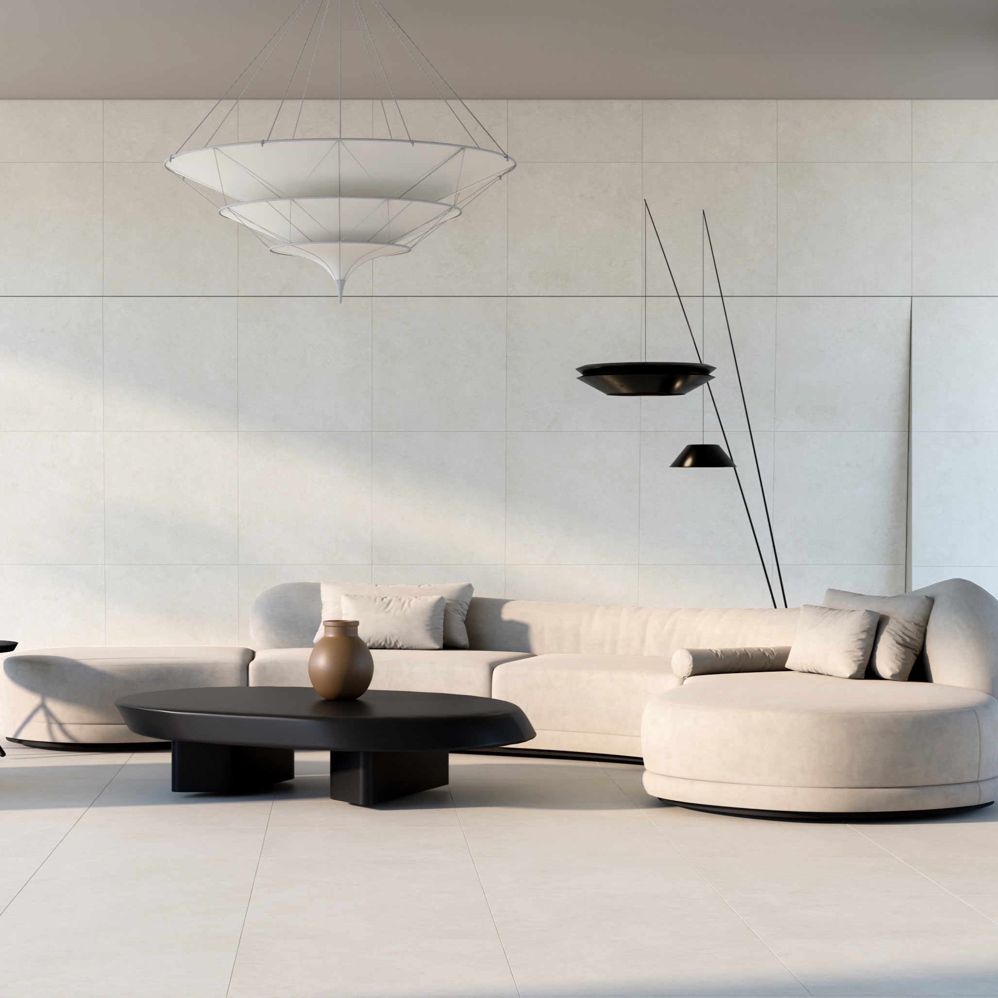 Modern living room with a white sofa, black coffee table, and decorative vases. Beige tiles on floors and walls