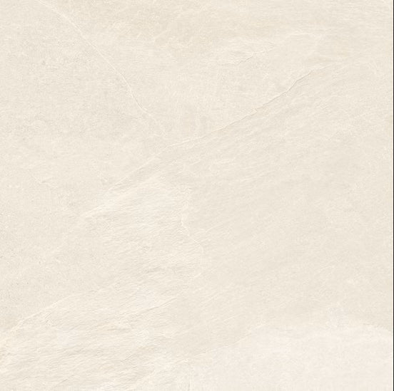 A close-up of a beige textured surface with subtle beige and cream marbling, filling the entire frame.